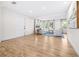 Bright living room with wood floors, a neutral color palette, and lots of natural light at 2244 Glenmoor N Rd, Clearwater, FL 33764
