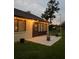Back patio with string lights for evening ambience, offers an inviting outdoor space at 2250 Sequoia Dr, Clearwater, FL 33763