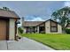 Charming home with a manicured lawn and attractive curb appeal at 2250 Sequoia Dr, Clearwater, FL 33763