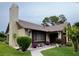 Inviting single-story home with well-maintained landscaping, complemented by colorful flowers at 2250 Sequoia Dr, Clearwater, FL 33763