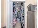 Walk-in closet with shelving and hanging storage, ready for organization at 2709 Via Cipriani # 522B, Clearwater, FL 33764