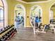 Community gym with a variety of exercise equipment and plenty of space at 2709 Via Cipriani # 522B, Clearwater, FL 33764
