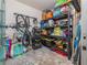 Tidy storage space with shelving and storage containers for organized living at 2709 Via Cipriani # 522B, Clearwater, FL 33764
