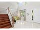Bright and airy living room with two-story ceilings and lots of natural light at 2935 Winglewood Cir, Lutz, FL 33558