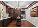 This spacious home features a beautiful wine cellar with custom wood cabinets and racks for all of your favorite wines at 2935 Winglewood Cir, Lutz, FL 33558