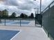 Community pickleball court bordered by fencing, offering an active and social recreational space at 301 Caloosa Palms Ct, Sun City Center, FL 33573