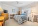 Cozy bedroom with patterned wallpaper and a comfortable-looking bed at 3136 Sandhill Dr, Holiday, FL 34691