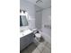 Bathroom with tile flooring, vanity sink, combination shower and tub at 3339 Avanti Cir, North Port, FL 34287
