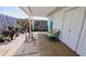 Charming patio area with a seating area and lush landscaping at 3339 Avanti Cir, North Port, FL 34287