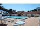 Community pool with plenty of chairs, tables, and a clean environment to relax and enjoy at 3339 Avanti Cir, North Port, FL 34287