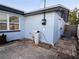 The back of the house features a patio with a well-maintained exterior at 3615 Kingsbury Dr, Holiday, FL 34691