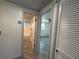 Hallway shot with view into bathroom and bedroom at 3615 Kingsbury Dr, Holiday, FL 34691