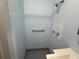 Shower area with shower head, towel bar and faucet at 3615 Kingsbury Dr, Holiday, FL 34691