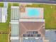Aerial view of the pool, spa, and bocce ball courts for community recreation at 37510 New Horizons Blvd, Zephyrhills, FL 33541