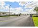 Gated entrance to the community with well-maintained landscaping and secure access at 37510 New Horizons Blvd, Zephyrhills, FL 33541