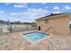 Hot tub with brick surround and safety rails offers a relaxing spa experience at 37510 New Horizons Blvd, Zephyrhills, FL 33541