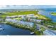 Overhead shot of waterfront condos showcasing the desirable coastal living with stunning water views and community amenities at 459 Bahia Beach Blvd, Ruskin, FL 33570