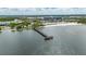 Scenic pier extending into the bay, with a view of the city in the distance at 459 Bahia Beach Blvd, Ruskin, FL 33570