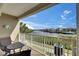 Outdoor balcony overlooking canal with lush landscaping, comfortable seating at 459 Bahia Beach Blvd, Ruskin, FL 33570