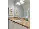 Bathroom vanity with granite countertops and decorative accents at 459 Bahia Beach Blvd, Ruskin, FL 33570