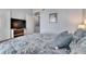Bedroom with coastal-themed decor, TV and a door to an outdoor balcony at 459 Bahia Beach Blvd, Ruskin, FL 33570
