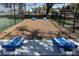 Cornhole boards in a community recreation area with playground, tennis court and seating at 459 Bahia Beach Blvd, Ruskin, FL 33570