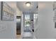 Bright entryway with a storm door that allows natural light and beautiful views at 459 Bahia Beach Blvd, Ruskin, FL 33570