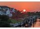 Exterior of waterfront homes during sunset at 459 Bahia Beach Blvd, Ruskin, FL 33570