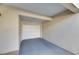 Attached single-car garage with a white panel door and a gray concrete floor at 459 Bahia Beach Blvd, Ruskin, FL 33570