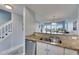 Kitchen sink with granite countertops overlooking the outdoor view at 459 Bahia Beach Blvd, Ruskin, FL 33570