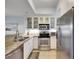 Modern kitchen featuring stainless steel appliances and granite countertops at 459 Bahia Beach Blvd, Ruskin, FL 33570