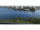 Beautiful waterfront view of boats docked along the channel under a clear blue sky at 459 Bahia Beach Blvd, Ruskin, FL 33570