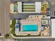 An aerial shot showcases a swimming pool, hot tub, and recreation area in a well-maintained community at 4851 W Gandy Blvd # B3 L8, Tampa, FL 33611