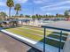 An elevated view shows a recreation area, pool and other homes in a lovely community on a clear day at 4851 W Gandy Blvd # B3 L8, Tampa, FL 33611
