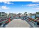 Dock with fish cleaning stations overlooking calm waters, providing a perfect spot for anglers at 4851 W Gandy Blvd # B3 L8, Tampa, FL 33611