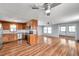 Open concept kitchen, with stainless appliances, flowing into the cozy living area at 4851 W Gandy Blvd # B3 L8, Tampa, FL 33611