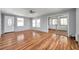Bright living room offers wood-look flooring, fresh paint, and plenty of natural light at 4851 W Gandy Blvd # B3 L8, Tampa, FL 33611