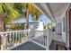 Peaceful porch with palm tree views and lots of potted plants at 4851 W Gandy Blvd # B3 L8, Tampa, FL 33611