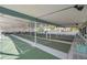 Community shuffleboard courts offer residents a fun and engaging recreational activity in a covered area at 4851 W Gandy Blvd # B3 L8, Tampa, FL 33611