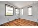 Sunroom with wood-look flooring, large windows, and plenty of natural light at 4851 W Gandy Blvd # B3 L8, Tampa, FL 33611