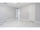 Bright bedroom with tiled floors and neutral paint at 7015 Cobblewood Ct, Tampa, FL 33615