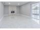 Spacious living room with tile flooring and fireplace at 7015 Cobblewood Ct, Tampa, FL 33615