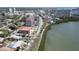 An aerial view of a beautiful condo complex near a picturesque river and adjacent to the city at 7037 Sunset S Dr # 205, South Pasadena, FL 33707