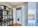 Convenient in-unit laundry closet with stacked washer and dryer at 7037 Sunset S Dr # 205, South Pasadena, FL 33707