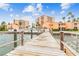 View of updated waterfront condos and amenities from a private pier with easy access to the ocean at 7430 Sunshine Skyway S Ln # 305, St Petersburg, FL 33711