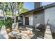 Cozy back deck with sliding glass doors leading to the interior, enhanced by serene outdoor views at 90 S Highland Ave # 6, Tarpon Springs, FL 34689