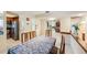 Bright dining room offering tile floors and views of the kitchen and living spaces at 90 S Highland Ave # 6, Tarpon Springs, FL 34689