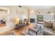 Cozy living room with a fireplace and sliding glass doors opening to the outdoor area at 90 S Highland Ave # 6, Tarpon Springs, FL 34689