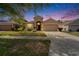 Beautiful single-story home featuring a two-car garage and well-kept lawn at 10229 Avelar Ridge Dr, Riverview, FL 33578