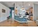 Open concept kitchen with breakfast bar and pendant lighting at 10229 Avelar Ridge Dr, Riverview, FL 33578